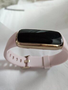 Fitbit Luxe Fitness & Wellness Tracker - Black screen & Gold colored trim